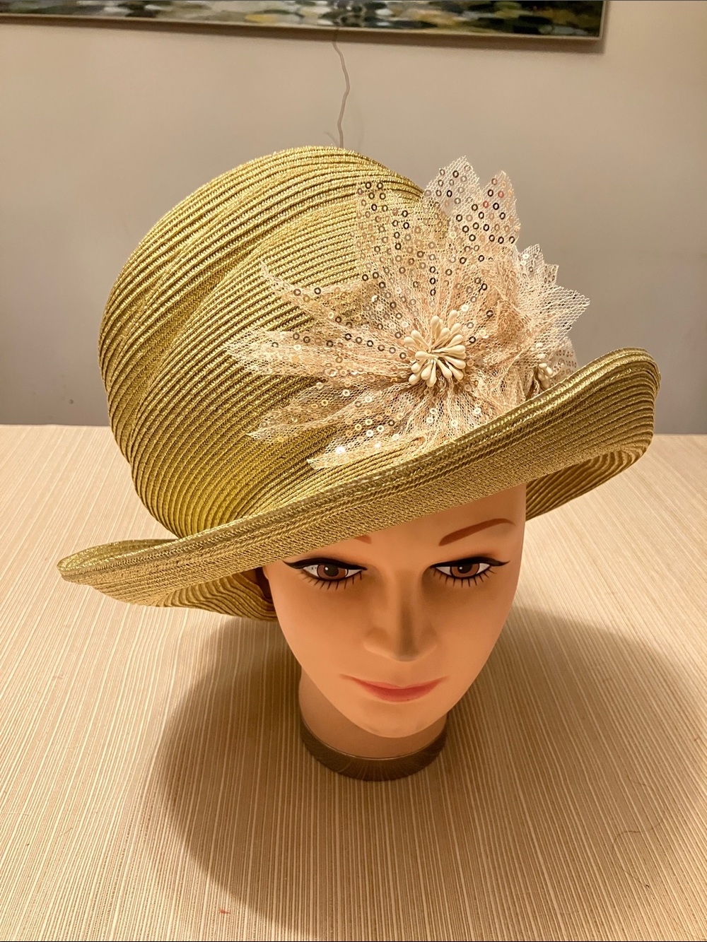 Elegant Metallic Gold Hat with Gold Sequined Floral Accents